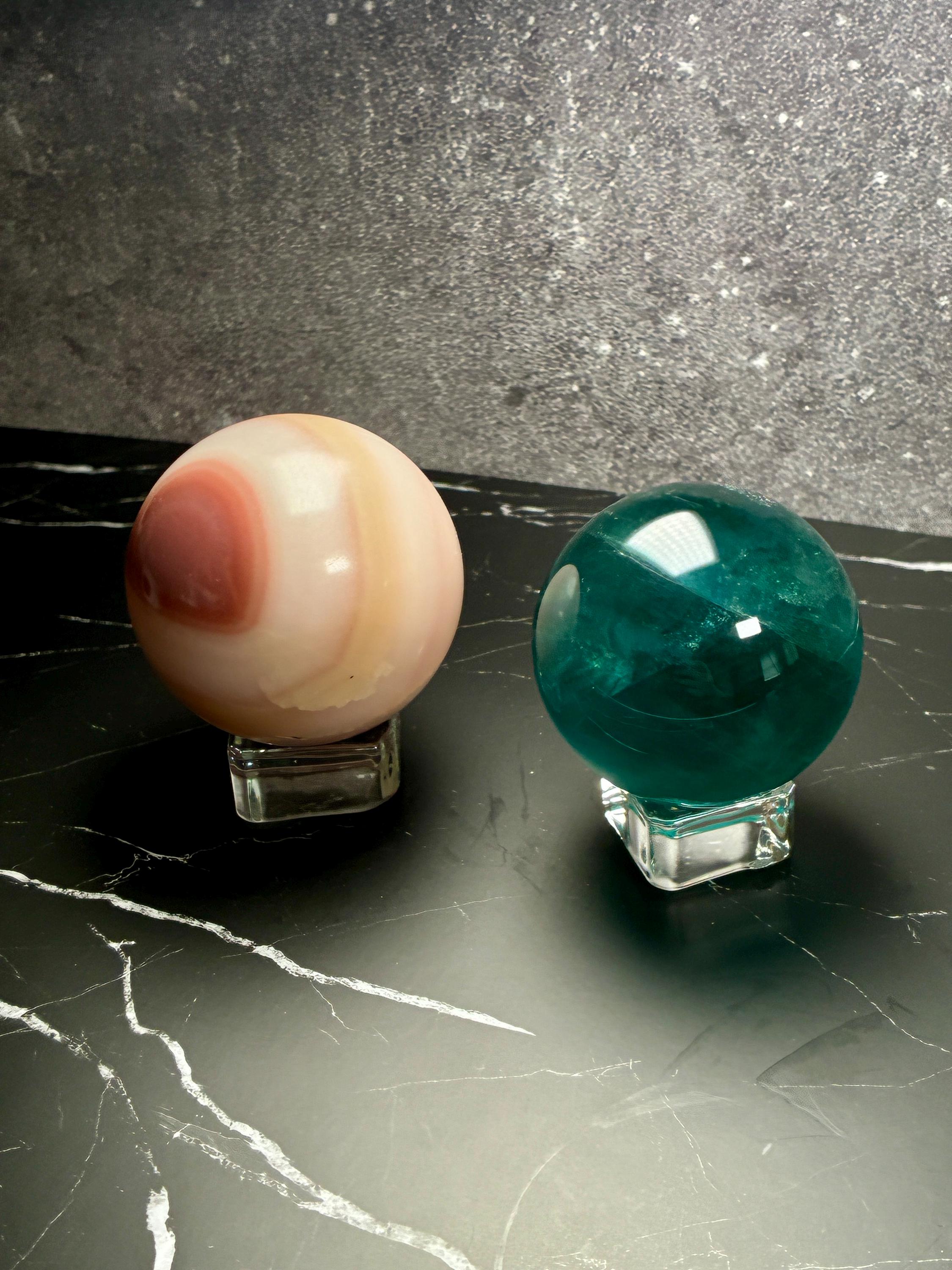 Pink Onyx (54mm) & Teal Fluorite (52mm) Spheres